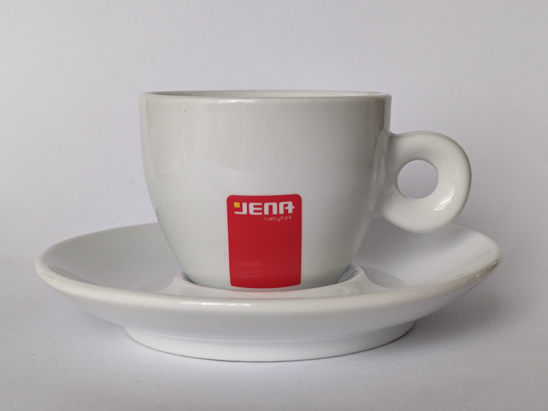 Jena nábytek, reklamní šálek