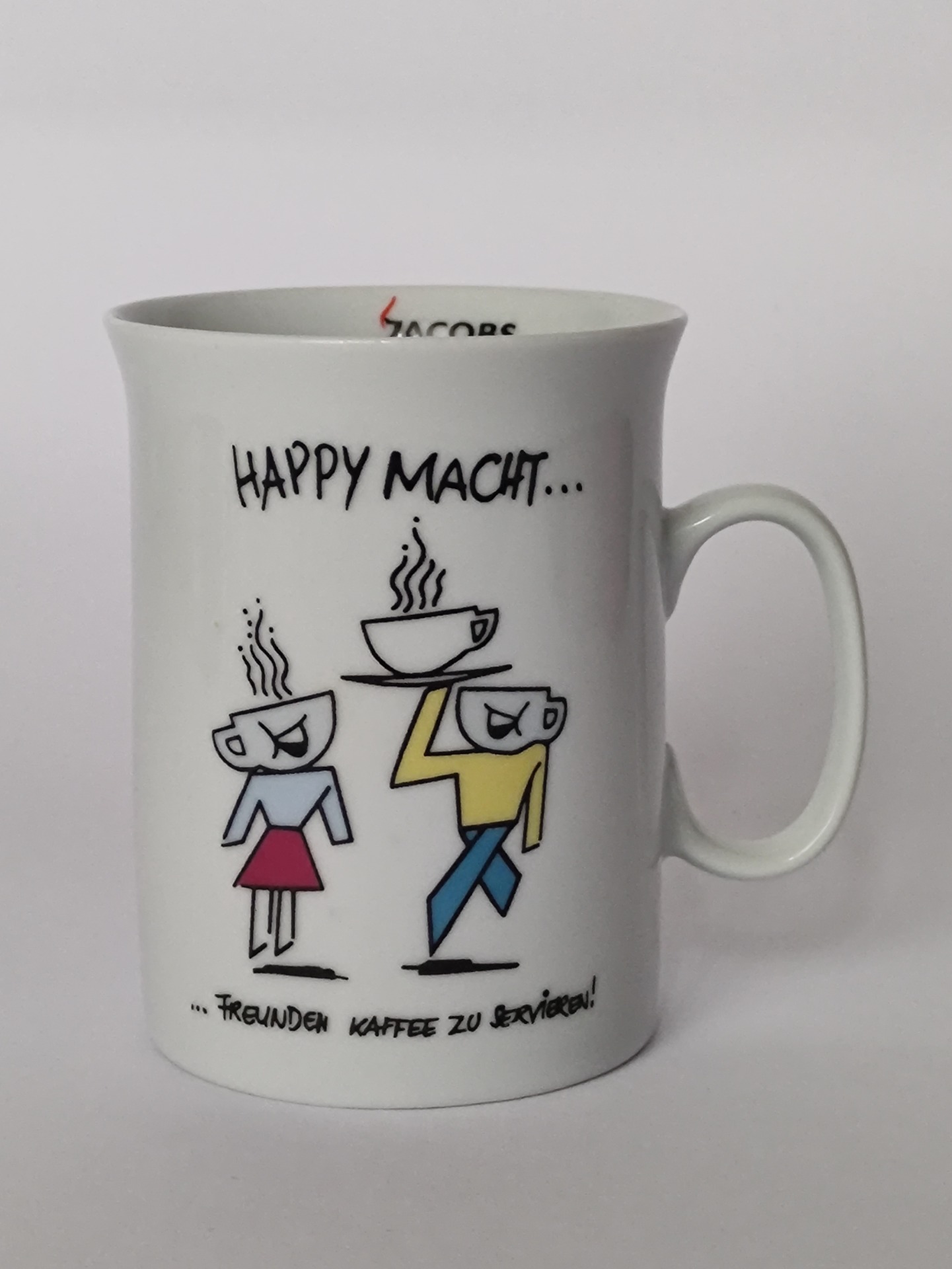 Hrnek z edice „HAPPY MACHT“ od Jacobs